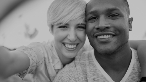 Man and woman taking selfie together